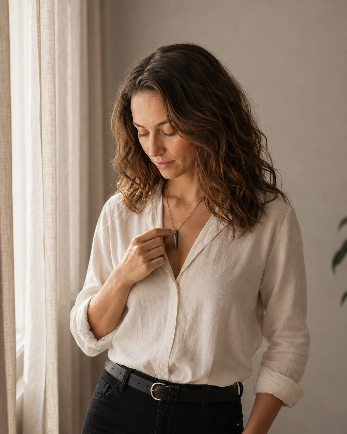 Illustrative everyday scene with one RESET breathing necklace